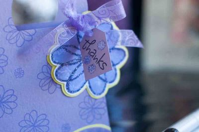 Purple Gift Bag
Take a look at some of the details from this project. Here is a close up of the tag and flower/glitter on Stephanie's purple gift box.
Keywords: purple flowers flower2doodle gift box glitter