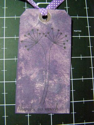 A tag
I glimmer misted tag with Pearl mist and then distressed with Tim Holz purple ink. TFL
