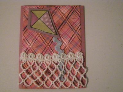 Kite card
I embossed the background patterned paper and distressed it. Used rickrack for the kite string and some fun vintage lace. TFL
