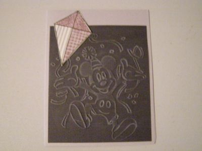 Mickey card
I used a CB Mickey embossing folder and decided to have him holding a kite. TFL
