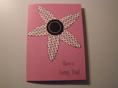 Sunny Day card
This is my "think outside the box" card.  I decided that the surfboard looked like the shape of a flower petal so I made it into a flower!! TFL
