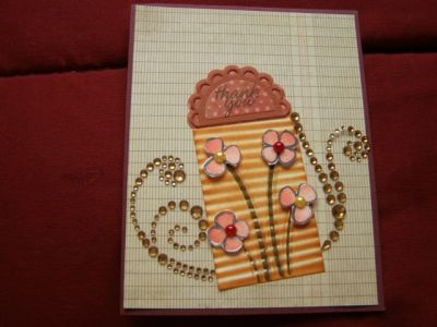 Thank you card
I used my paper crimper and crimped some paper and then distressed with distress ink.  I used a MFT die for the top where I stamped thank you.  I used some pearls for flower centers and some bling swirls! TFL
