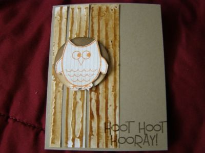 I embossed some glossy paper to resemble a tree trunk. TFL
