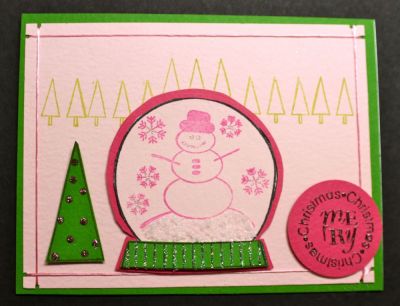 This is my challenge creation. The snow globe is pop dotted. The snow under the snowman is Flower Soft Polar White. I stamped the base on Kiwi and added a glitter pen to the lines.  The greeting is stamped in black and embossed with clear powder. The Kiwi tree has pink Stickles on the ornaments. The corners are punched with a Southwest Ribbon Punch to add a border of thread. 

