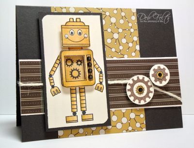 Get in Gear!
Love this cute little robot!  I stamped his "belly" twice, cut out the center panel of one to pop up and add some dimension with an inner view and black rhinestone "knobs."
