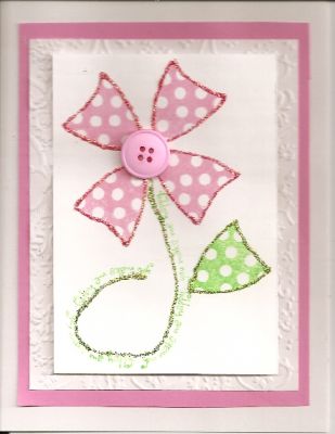 Pink Flower
 Got the idea from the gallery.  Of course I had to add glitter glue and a real button.
Keywords: pink flower