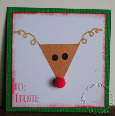 Rudolph
It's Christmas in May! I saw a reindeer when I looked at the solid triangle and curly ribbon striings. I added a red pom for the nose. The to: and from: are from Joy2Christmas and the eyes are the smallest solid circle from Back2Basics. 
