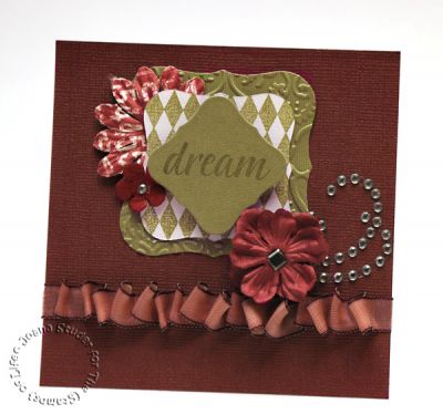 Dream
4.25" square card
Paper Studio textured darks cardstock
Amy Butler cardstock
Backgrounds2Build diamond stamp
Swirls2Build dream stamp
CTMH Olive ink
Prima Marketing flowers
Nestabilities dies
Cuttlebug embossing folder
rhinestones
ribbon
brad
3-D foam adhesive

Keywords: backgrounds2build