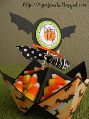Thanks 2 Fall Bat Treat Cup
This cootie-catcher-turned-treat-cup features stamps from the Thanks 2 Fall set. The bat wings were made by altering a holly leaf die cut.

Designed by Julie Griffith
