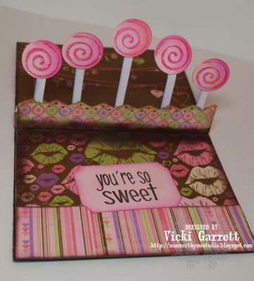 A Garden of Lollies!
A fun pop up card. you can find the directions on how to do the fold here

http://valitasfreshfolds.blogspot.com/2010/01/pop-up-balloon-card.html
Keywords: candy2share
