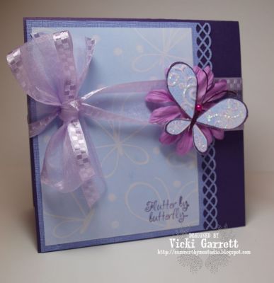 Eggplant Flutterby
I used an emboss resist technique to create the subtle butterfly background for this card. Using Glossy paper, stamp the images in Versamark Ink. Taking a brayer, roll the  desired dye ink over the images, fully covering the paper. You can then take a soft cloth/paper towel and wipe the excess ink off, creating a soft background
Keywords: Emboss Resist Butterflies to Build