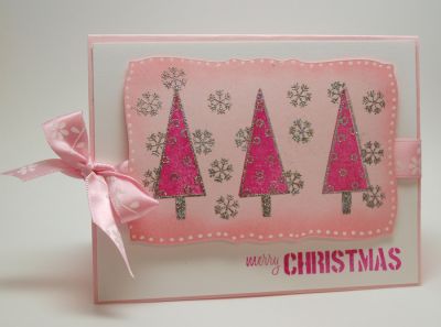 Christmas in Pink
Love the two step stamping Trees! I was able to stamp the tree image in a Vibrant Pink and then use Versamark and Silver embossing powder for the outlines!
Keywords: Joy2Christmas