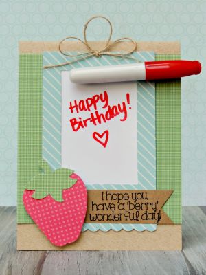 *Strawberry marker board card
I created a card with a mini marker board on it, using Dry Erase paper from DCWV. I attached a mini dry erase marker to the card, and wrote a message. The board can be easily removed from the card and hung using the loop above the bow. 
