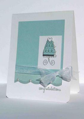 Blue congratulations
Love blue and white together for wedding goodies!!!! The blue cardstock and scalloped border are new from SEI's Corrine collection, and the ribbon is from JoAnn Essentials.  
