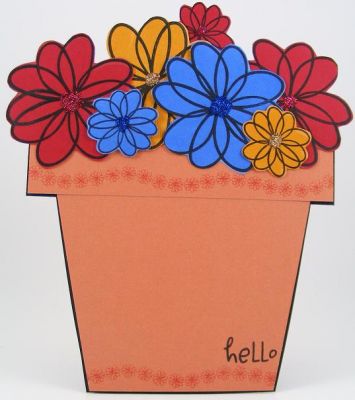 Flower Pot "Hello" Card
Features flower2doodle clear stamp set.  I have had the most fun designing with the flower 2doodle set!!!!  Love, love, love it!!!!!  :)  I used a ruler and threw the flower pot on some terra cotta colored cardstock.  :)  I also used PK Glitz glitter in the centers of the flowers.
Keywords: flower2doodle SOL