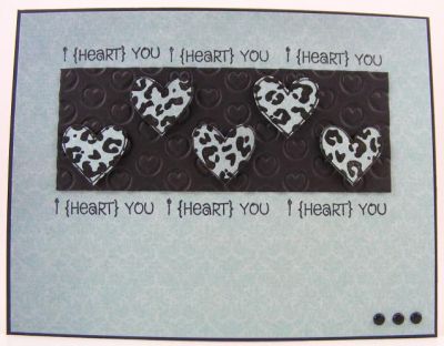 I {Heart} You Card
Stamp a leopard background using animals4prints and then overstamp with a heart from Love2Hug to create the hearts.  The sentiment is from tinytitles2stamp.  The embossing folder is by Sizzix.  Easy peasy.  :)

http://bevscreativepath.blogspot.com/
Keywords: tinytitles2stamp