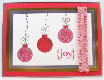 "Joy" Ornaments Card
Card features the clear SOL set "Holly4Christmas".

The ornaments are heat embossed with silver and gold powders.  It also has gold and silver foil board matting (which does not show up well in my photo....prettier in person.)  :)
Keywords: The {Stamps} Of Life