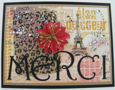 Merci Card
I used the leopard background stamp from the animals4prints clear stamp set.  The letters were cut with the Sizzix eClips.  The patterned paper is by 7 Gypsies.  The flower and rhinestone/pearl swirls are by Prima Marketing, Inc.
Keywords: animals4prints