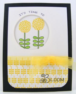 Time To Bloom Card
I used the circle Sizzix Framelit to create the "window" with foam tape.  The mums are stamped on another piece of white cardstock underneath.  Used the small stems stamp to do the pattern on the bottom of the top layer. 
Keywords: moremums2love