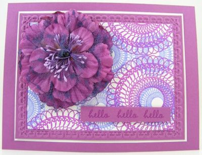 Spiros Hello Card
I created the background spiros paper using the spiros2stamp clear stamp set.  The flower is by Prima Marketing, Inc.  The embossing folder is by Sizzix.
Keywords: spiros2stamp