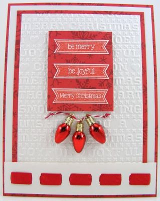 **Be Merry Card**
Quick and easy card by stamping the three sentiments and pairing them with a Sizzix embossing folder.
Keywords: lights4Christmas
