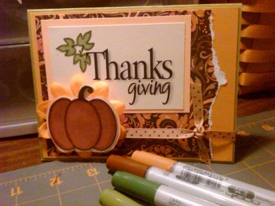 Thanksgiving Pumpkin  TSOLC01
I used the digital stamps from the October release. I colored them on the computer then went over with COPICs. 
I dug up some fallish looking pattern paper and Voila!

