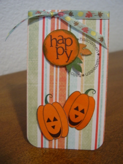 Trick or Treat mini card
The dot is from the Basic set.  All images except the Halloween circle and the stems  are stamped and cut out and mounted with pop dots.  The inside is stamped with the Trick or Treat stamps.  Going to make a few more of these for special tricksters.
