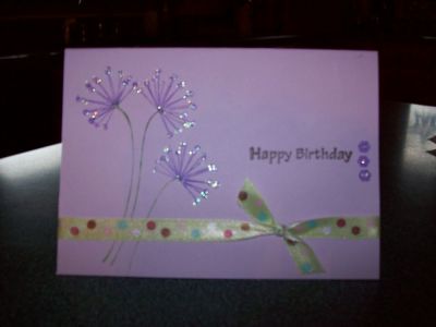 Made a Birthday Card with Sparkle glue over stamped image.
