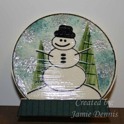 Snow Globe Tag
I used Stephanie's great masking tips on this christmas tag.  This tag folds at the top and the to/from is stamped on the inside.  I heat embossed the snowflakes and then applied glossy accents over the top of the globe.
