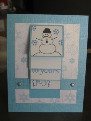 waterfall xmas card
i love how this turned out i used both xmas stamps joy2christmas and holly4christmas. you pull the little blue tab on bottom (still need to add ribbon for the pull) . i added another picture of when its pulled
