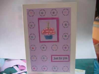 challange card just for you
i printed digital stamp day on lavender paper in 4 columns and 6 rows i then stamped small stars into the circles in various colours ,small cupcake on lavender paper was stamped with clear ink and i chalked the base blue  and the frosting pink and the candle green and flame yellow i added clear accents to the flame  and the frosting  and then sprinkled fine glitter "candy rainbow" over this . i mounted this on to dark purple paper and placed on the lavender paper  i then added thestamp just for you in black
