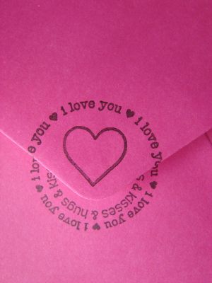 detail of envelope
A detail photo of the "Thank-You Valentine" I sent to my grandmother. I used the envelope flap as a little faux-mask... the inner circle is completely visible under the flap, but covered by the flap when closed, which completes the outer circle.
Keywords: love2hug, valentine, envelope