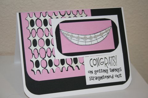 BRACE YOURSELF!!
I received this stamp set on the same day my daughter was getting her braces.  I didn't see a hammock...I saw a mouth with braces on it.  I took a versamark pen and drew the braces on then embossed with silver.  Hope you like it!

