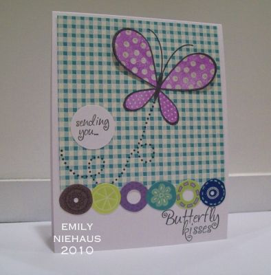 Butterfly Kisses...
LOVE this set!!! I stamped the butterfly in black and then stamped the wing pieces with Orchid Opulence ink.  I popped up the wings on top for dimension.  I stamped the dotted "trail" in black onto the DP.  Both the DP and the die-cut border are from K&Company Poppyseed collection.

TFL!

http://emmielouwho.blogspot.com/
