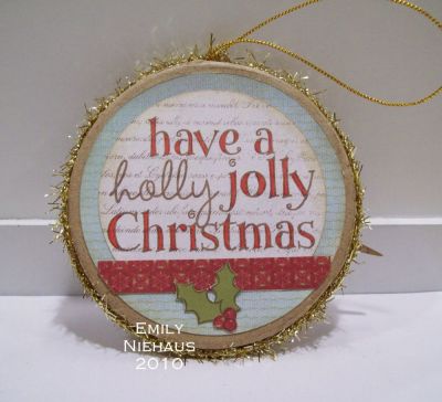 Red Bird Christmas ornament-back
I used designer paper from Memory Box's Mistletoe collection to cover a kraft paper mache ornament I bought at Hobby Lobby.  I stamped my sentiment in Memento Rich Cocoa ink and colored in with a red Copic Marker.  I paper pieced the holly image at the bottom.  I glue some gold tinsel ribbon around the edge.

Check out my gallery to see the front of this ornament!

http://emmielouwho.blogspot.com/
Keywords: Holly4Christmas Christmas ornament