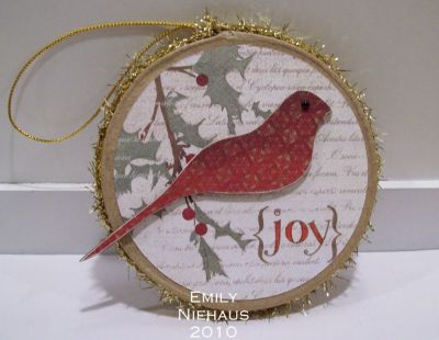 Red Bird Ornament-front
I bought an unfinished kraft paper mache type ornament at Hobby Lobby.  I covered it and the bird chipboard with paper from Memory Box's Mistletoe collection.  I added a Kaiser pearl in black for the eye.  I stamped the "joy" in red.

Please see my gallery for the back of this ornament using more stamps from Holly4Christmas!

http://emmielouwho.blogspot.com/
Keywords: Holly4Christmas Christmas ornament