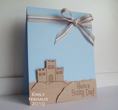Have a Sunny, Sandcastle kind of day!
I stamped the sentiment and castle in Memento Rich Cocoa ink.  I tore some kraft paper to look like sand and then used that old fashioned spritzer tool from SU with a chocolate chip marker to give it a more textured sand look.  My ribbon is American Crafts.  An easy peasy kind of card!

http://emmielouwho.blogspot.com/
Keywords: summer4fun CAS