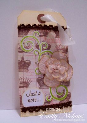 *Just A Note Tag...
I just adore swirl dies.  They are so versatile and can be used on so many different projects.  I also used Stephanie's Flower Layers & Centers Bigz die from Sizzix.  I added distress inks to the edges and lots of chunky glitter to the petals.  The center which is a circle die, I scrunched up into a ball before adding the glue and glitter. 

TFL!

http://emmielouwho.blogspot.com/

