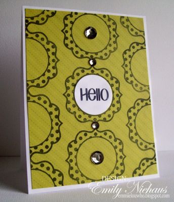 *Hello
I took the polka dot frame and stamped it in a pattern onto the green paper.  I then used a 1 1/4" punch to punch my "Hello" sentiment for the center frame.  I added some gems above and below the white sentiment circle.

TFL!

http://emmielouwho.blogspot.com/
