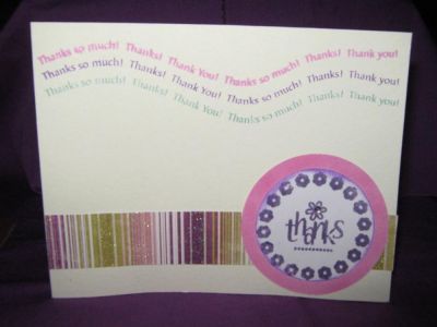 thank you card in cream with stripes
cream card stock stamped with 3 colors
strip of patterned paper
stamped circle layered on pink cardstock circle
rhinestone accent in center of flower.
Keywords: thank you