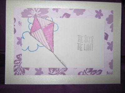 the sky is the limit
cream colored shimmer card stock
layered purple patterned paper
stamped rectangle with blue clouds and string and sentiment in black
kite in pink, cut out and pop dot
Keywords: the sky is the limit