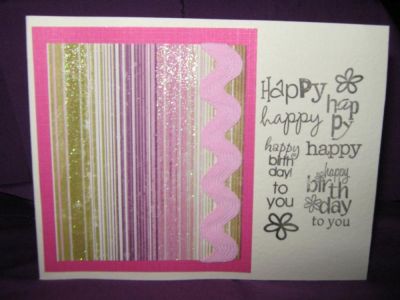 happy birthday in pink
cream card stock stamped with all the happy and happy birthday stamps
pink cardstock layer onto card
striped patterened paper wrapped with large pink rick rack
Keywords: happy birthday