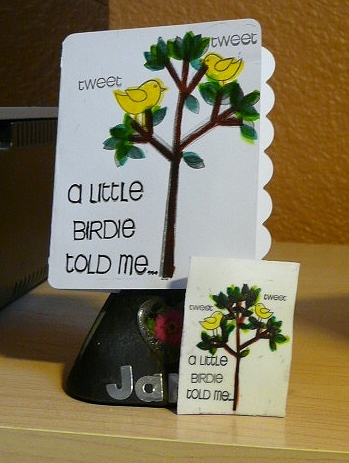 Card & magnet
Card cut out with Cricut "Christmas Cheer."  Used Stamps from Trees2Build set, colored with Marvy Le Plume II markers.

Smaller item resting against card is a Shrinky Dink stamped on the Shrinky-dink printer paper.  Heated w/ embossing heat gun & colored w/ Marvy Le Plume II markers.  
