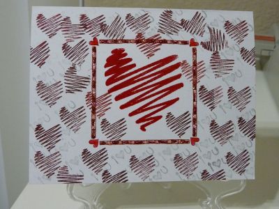 Glittering Hearts
Used Silver to stamp the "I HEART U" diagonally; used Embossing powder for the center heart.  Used Sakura Glaze pens for the corners of the 'frame' around the center heart.  Used Stickles for the frame, alternating the "Diamond" with the "Candy Cane" colors.  
Keywords: Heart, Anniversary, Jannarama