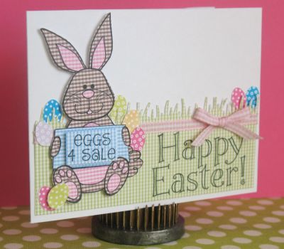Happy Easter
I paper pieced this cute little guy from gingham paper and adhered him with foam dimensionals.  Isn't he a cutie??  I also cut out some stamped eggs and placed them around him.  
Keywords: bunny4Easter