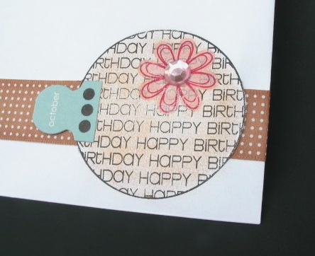 Circular Birthday Stamp
Love these circular word stamps!  I made this for an envelope for my sister's birthday card.  I stamped the birthday circle stamp directly on the envelope and added brown chalk.  I used a floral rub-on and rhinestone from Bazzill and a blue "October" miscellaneous tag (QVC?).  I stamped the tag with 3 dots from the calendar2build clear stamp set.  Finally, I cut the sides of the circle to make room for the ribbon to go underneath and around the envelope.  The most fun I've ever had decorating an envelope!
Keywords: birthday, circular stamp, sentiments4circles, envelope