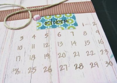 October Birthday Card With Calendar
Wish I could upload more than one picture so you could see more of this card!  I had so much fun with the calendar stamp from The Stamps of Life!  This is the inside of a birthday card I made for my sister.  Stamped in brown ink, the calendar is highlighted with half of a file folder (green/blue) stamped with a S.O.Life "october" stamp.  A little pink rhinestone (mimicks the October birthstone) adds some bling to the corner of the envelope.  Accented with adhesive ribbon and a piece of twine/"rope".
Keywords: Calendar, birthday, October