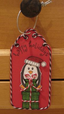 Penguin with Stacked Gifts/Tag
Some fussy but satisfying paper-piecing! The black/white twine makes this a little too visually busy, but I had fun curling it around the scalloped outline of the tag.
