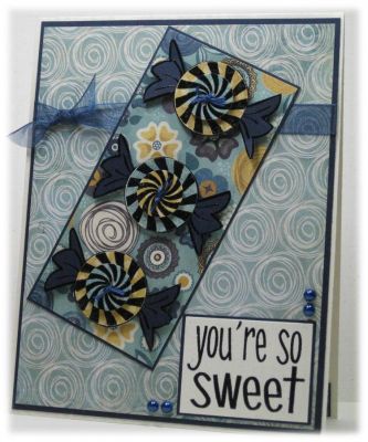 Sweet You
The candies are three layers deep with the last layer I made into buttons and popped up with foam tape. 

http://ninascardart.blogspot.com/

Keywords: candy2share