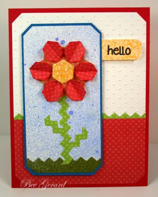 * A Hello Flower!
I created this flower using the Hexagon Die Set!   Stephanie Barnard's delightful "Sparkles!" glitter creates the extra pizzazz (glitz) on the blossom.  The sky, grounding, and sentiment tag are 'colored' by using Stephanie Barnard's "Sprays!" in Sky, Olive, & Banana.  The stem was created with the Chevron Die Set.  ;)
Keywords: hexagons2love, Hexagon Die Set, Chevron Die Set